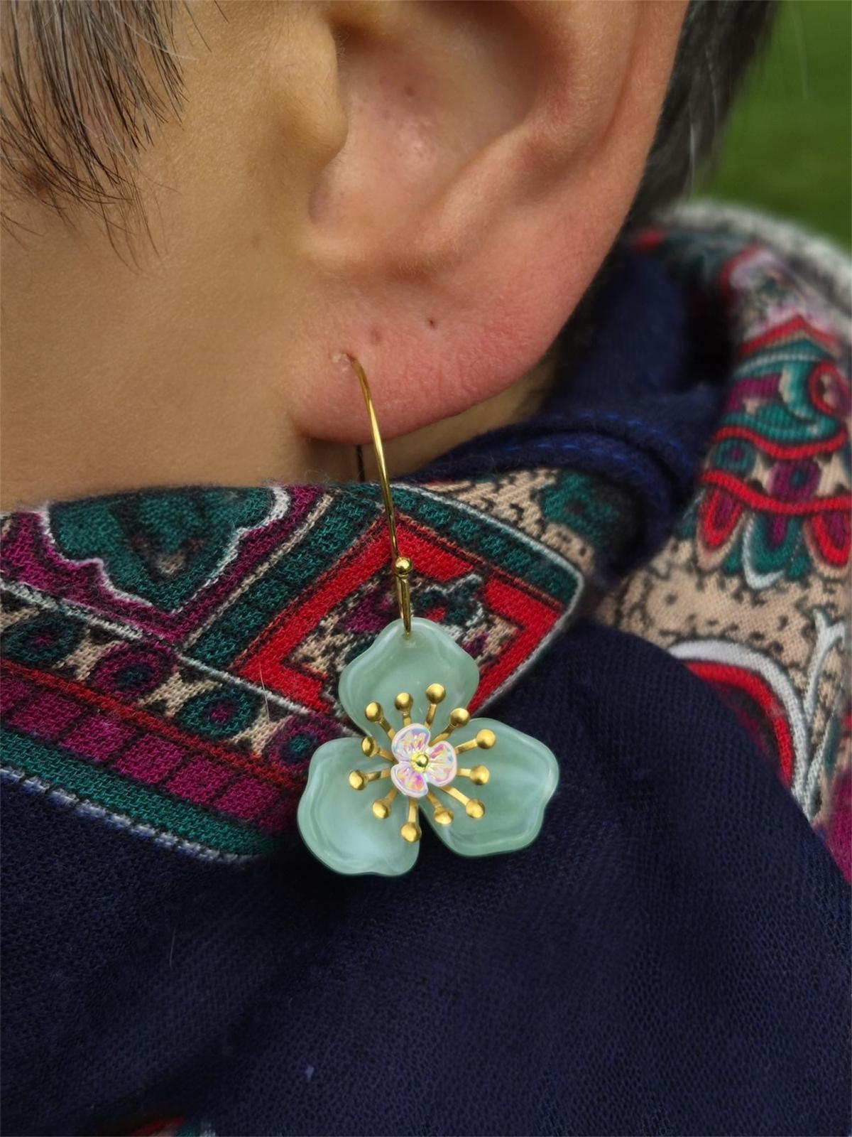 Boucles d'oreilles avec fleur verte